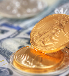 GOLD PRICES DEFY DEMAND DROP