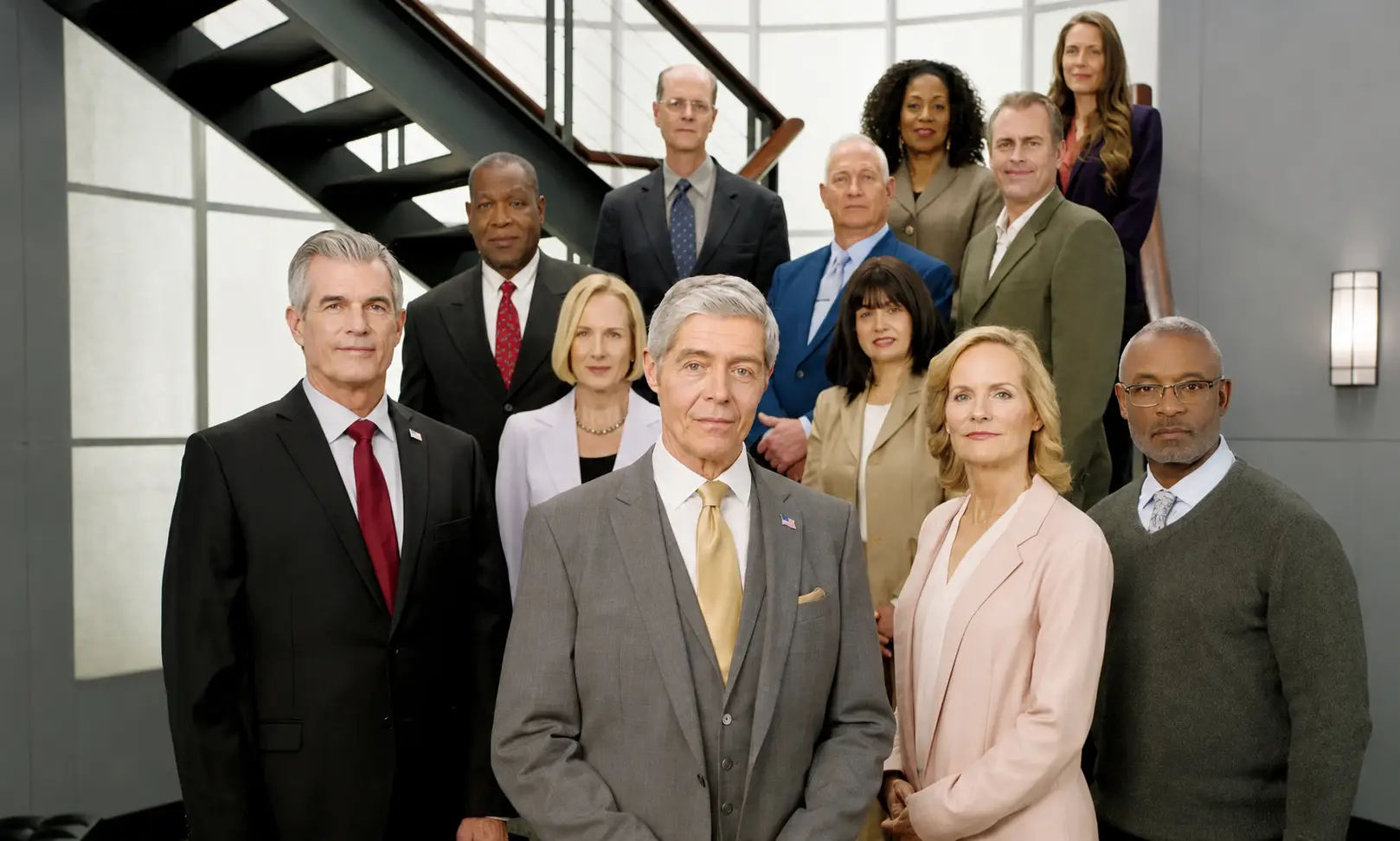 Nationwide Coin & Bullion Reserve leadership team standing together in an office.