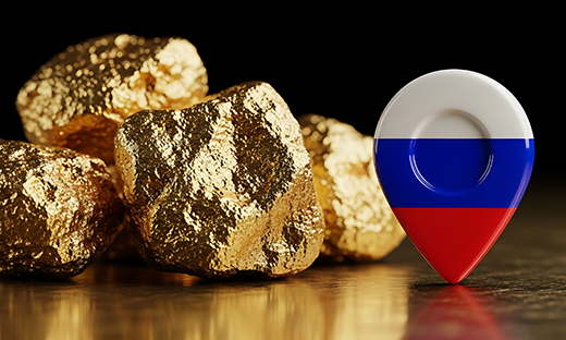 Gold nuggets beside a Russia map marker illustrating Russia's expanding gold production and strategic gold reserves